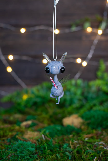 Flying Light Sprocket Ornament w/ Candy Cane (cream) #144