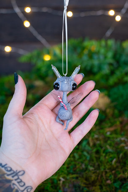 Flying Light Sprocket Ornament w/ Candy Cane (cream) #144