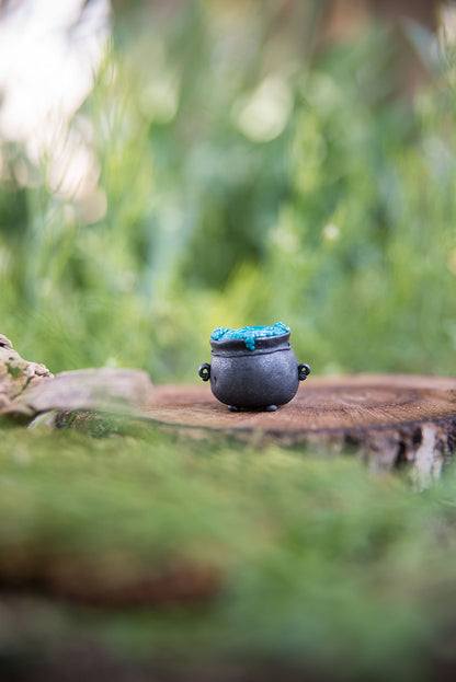 Black Cauldron w/ Bubbling Blue Potion Spore #34