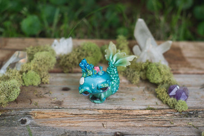 Top Tail View of Blue & Green Mermish - handmade polymer clay mermaid creature with coral reef on head holding obsidian