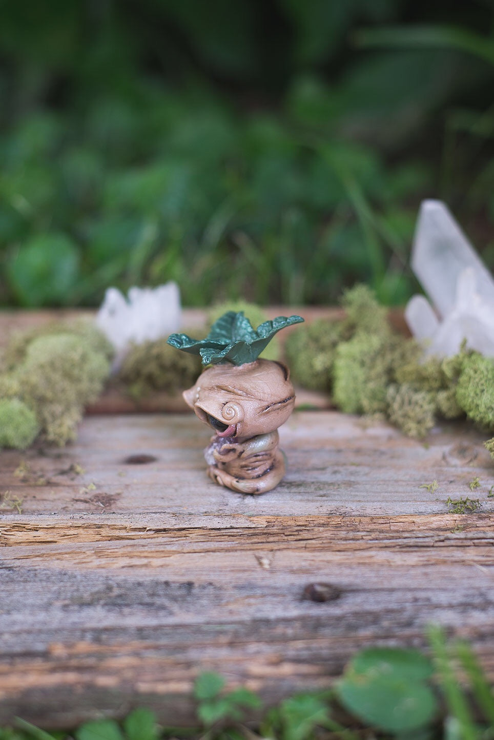 Left-Side View of Beige Mandrake Mish - handmade polymer clay mandragora root creature with holding fluorite