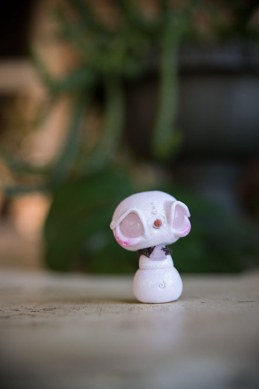 SALE! Snowmish with rose quartz eyes, holding rose quartz #98