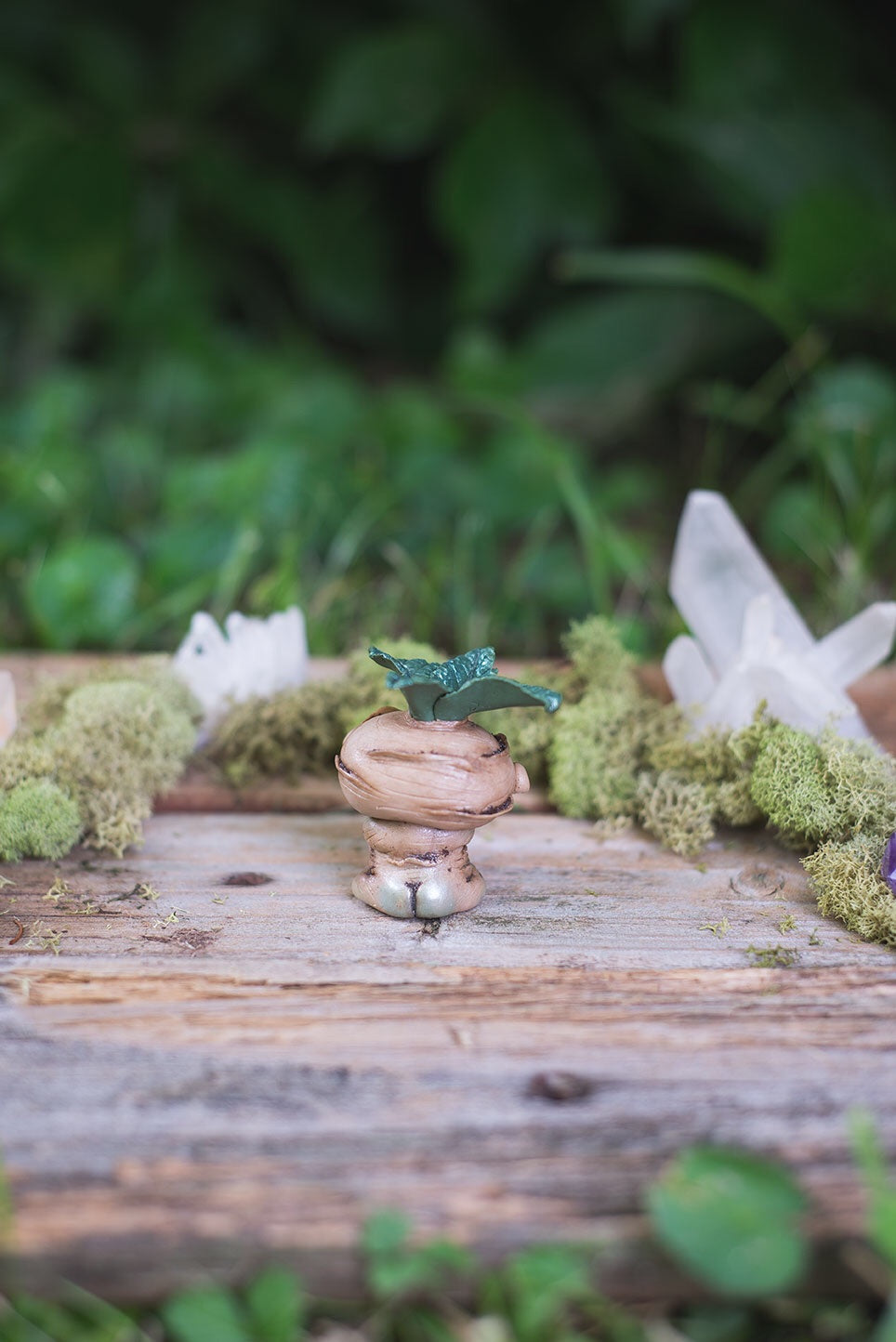 Back View of Beige Mandrake Mish Tush - handmade polymer clay mandragora root creature with holding fluorite