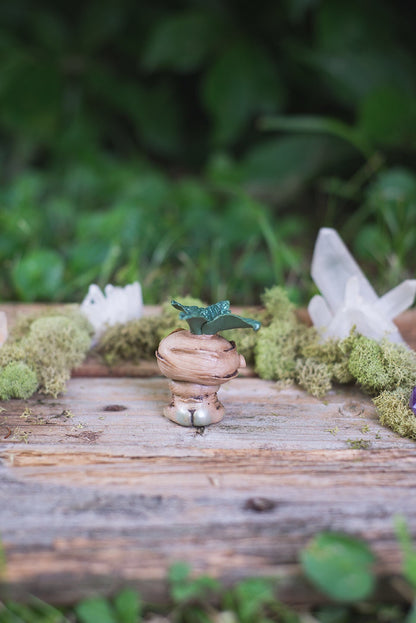 Back View of Beige Mandrake Mish Tush - handmade polymer clay mandragora root creature with holding fluorite