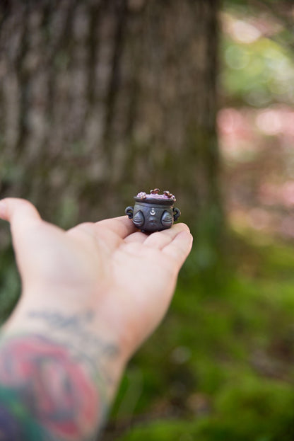Black Cauldron w/ purple butterfly Potion Spore #56